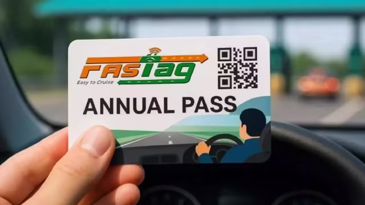A phone displaying the Rajmargyatra app with a FASTag logo.
